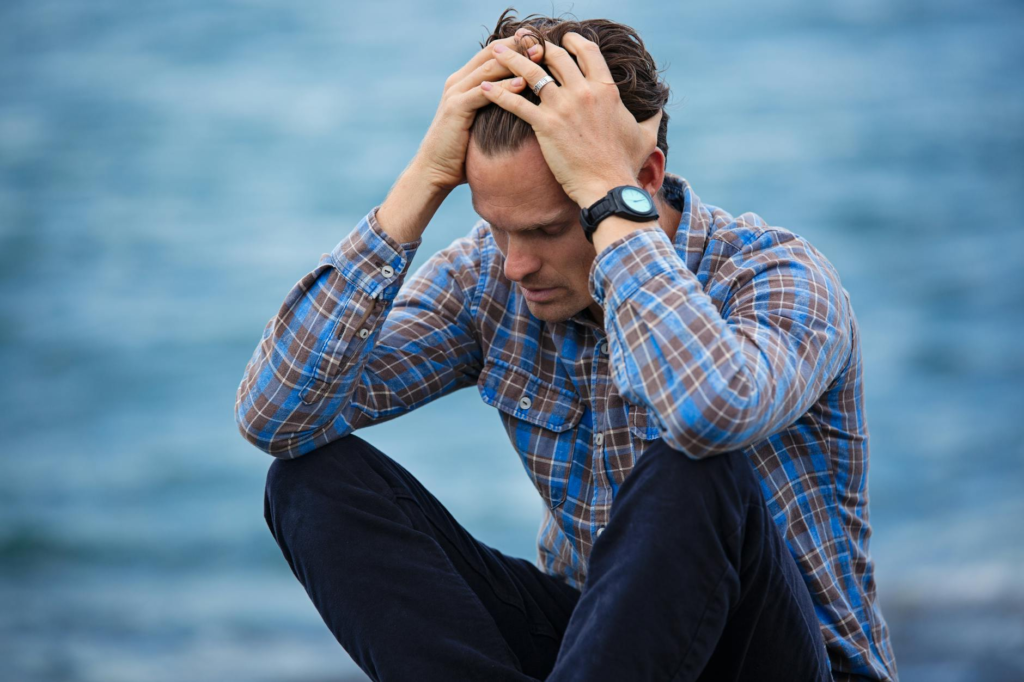 A man looking distressed 